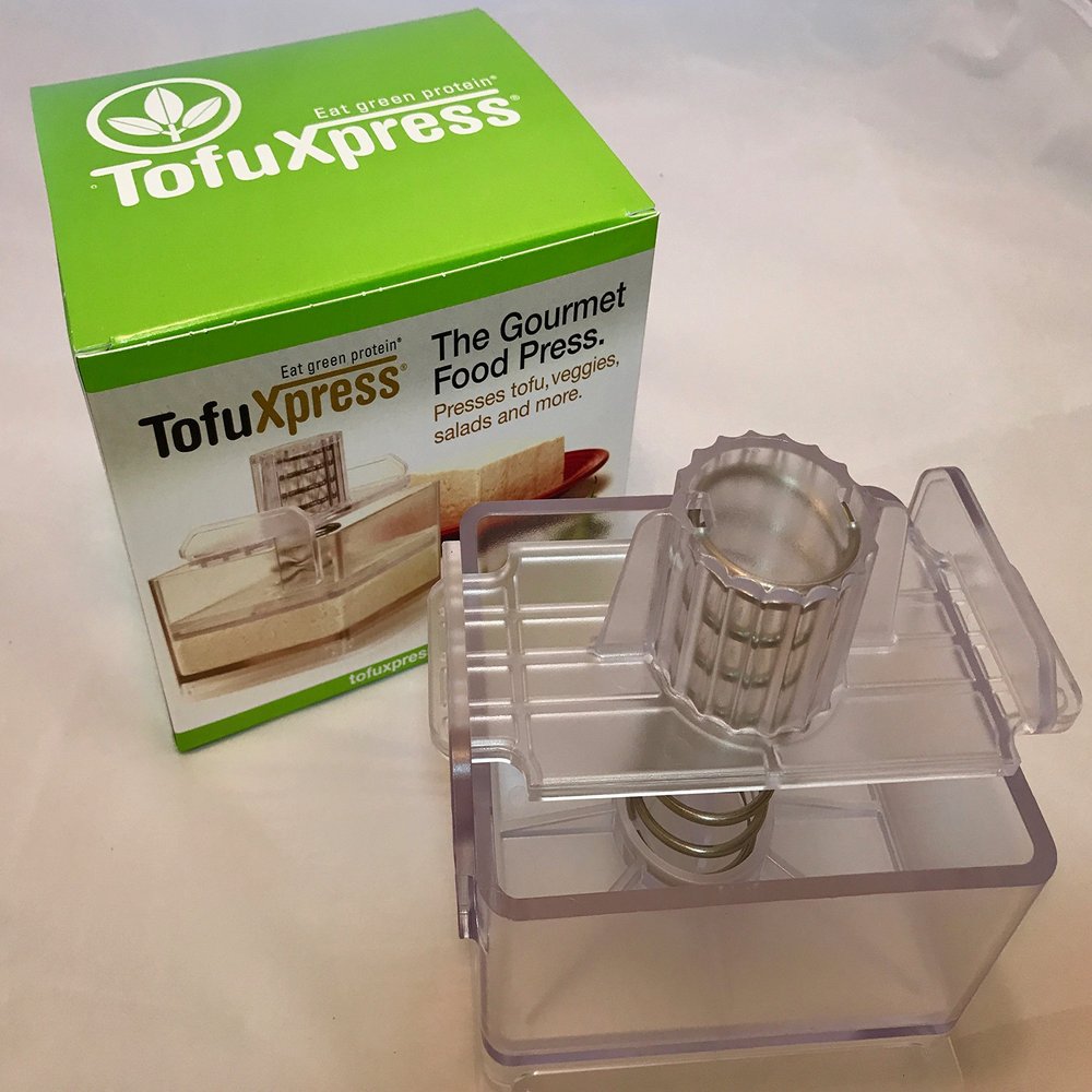 Gourmet Tofu Press / Marinating Dish - Clear. TofuXpress removes moisture from tofu and other foods automatically without mess. by TofuXpress