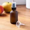 2 oz Frosted Amber Glass Boston Round Black Treatment Pump Bottle (6 Pack) + Funnel view 4