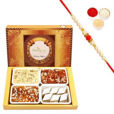 Ghasitaram Gifts Rakhi Gifts for Brothers Rakhi Sweets - Big Box of Kaju Katli, Soan Papdi, Dodha Barfi and Milk Cake with Pearl Beads Rakhi