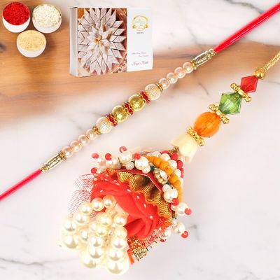 Ghasitaram Gifts Rakhis Online- Enticer of Faith Bhaiya Bhabhi Rakhi with 200 GMS of Kaju katli
