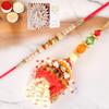 Ghasitaram Gifts Rakhis Online- Enticer of Faith Bhaiya Bhabhi Rakhi with 200 GMS of Kaju katli view 1