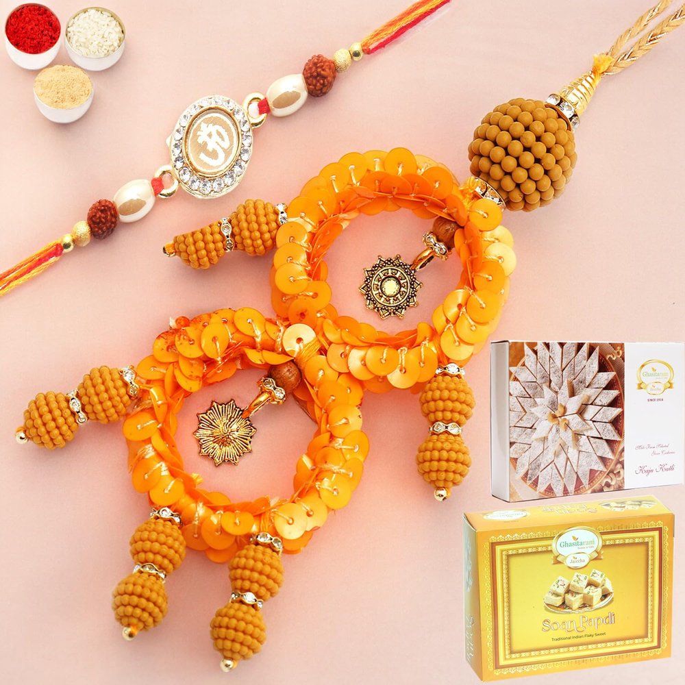 Ghasitaram Gifts Rakhis Online- Sisters Blessings rm073 Bhaiya Bhabhi Rakhi with 200 GMS of Kaju katli and 200 GMS of Soan Papdi