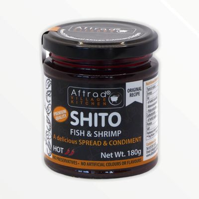 Aftrad Village Kitchen Shito 180g, Hot - A Ghanaian chilli sauce made with smoked fish & shrimps a wonderful condiment for all cooked meals. It can be used as dips, spreads and in sauces.