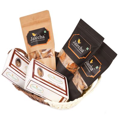 Brown Basket of Traditional Gujiyas, Dry Sweet Gujiyas, Gujiya Namkeen Pouch, SOYA Sticks Pouch, Farsaan Samosa Pouch and Flavoured Almonds Pouch