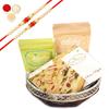Ghasitaram Gifts Rakhi Gifts for Brothers Rakhi Sweets - Round Basket of Almonds, Raisins and Soan Papdi with 2 Pearl Beads Rakhis view 1