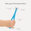 Frida Baby Toothhugger Kids Toothbrush: U-Shaped Toothbrush with Triple-Angle Bristles, Easy-Grip Handle, Soft Toothbrush Bristles, for Toddlers and Kids 2+ Years Old, Blue view 4