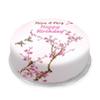 Victoria Sponge pink blossom tree themed birthday cake - A delicious traditional vanilla sponge cake with buttercream and a rich apple and raspberry jam, serves 10-12 portions. Baked by bakerdays. view 1