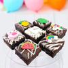 Limited Edition Chocolate Fudge Brownies - 9 Chocolate Fudge Brownies Topped with Sugar Decorations and White Chocolate and Vanilla Icing. Serves 9 portions. Baked by bakerdays (Tropical) view 2