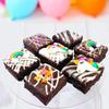 Limited Edition Chocolate Fudge Brownies - 9 Chocolate Fudge Brownies Topped with Edible Sugar Decorations and White Chocolate and Vanilla Icing. Serves 9 portions. Baked by bakerdays (Unicorn) view 2