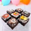 Limited Edition Chocolate Fudge Brownies - 9 Chocolate Fudge Brownies Topped with Sugar Decorations and White Chocolate and Vanilla Icing. Serves 9 portions. Baked by bakerdays (Safari) view 2