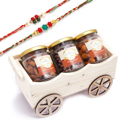 Ghasitaram Gifts Rakhi Gifts for Brothers Natural Wooden Cart with Chocolate Coated Butterscotch, Crunchy Coated Cashews and Peri Peri Almonds Jars with 2 Rakhis
