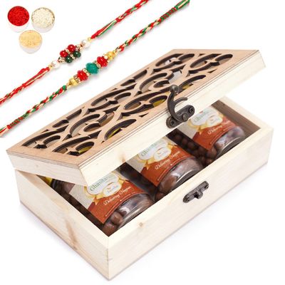 Ghasitaram Gifts Rakhi Gifts for Brothers Natural Wood Carving Box with Chocolate Coated Almond, Chocolate Coated Butterscotch and Chocolate Coated Rasins with 2 Rakhis