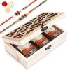 Ghasitaram Gifts Rakhi Gifts for Brothers Natural Wood Carving Box with Chocolate Coated Almond, Chocolate Coated Butterscotch and Chocolate Coated Rasins with 2 Rakhis view 1
