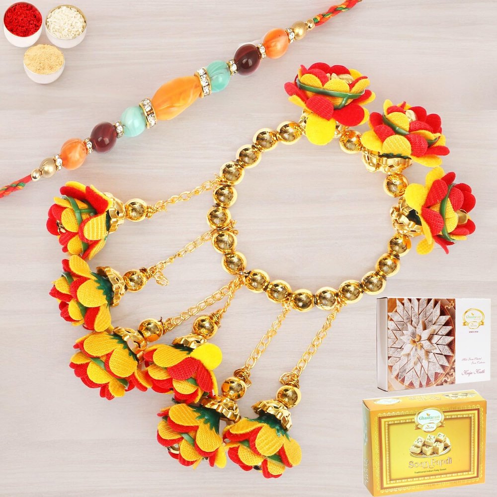 Ghasitaram Gifts Rakhis Online - Rakhi for Brother-TK-27 Bhaiya Bhabhi Rakhi with 200 GMS of Kaju katli and 200 GMS of Soan Papdi