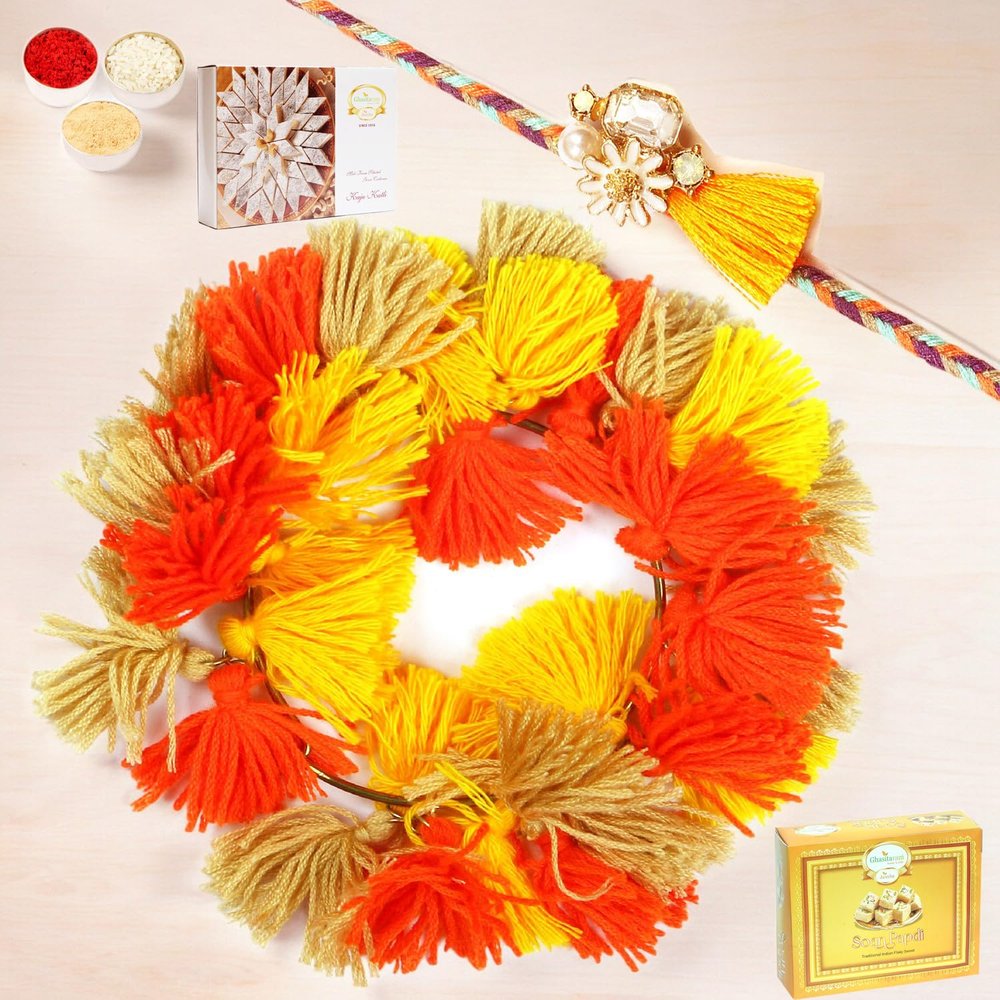 Ghasitaram Gifts Rakhis Online - Rakhi for Brother-RM-268 Bhaiya Bhabhi Rakhi with 200 GMS of Kaju katli and 200 GMS of Soan Papdi