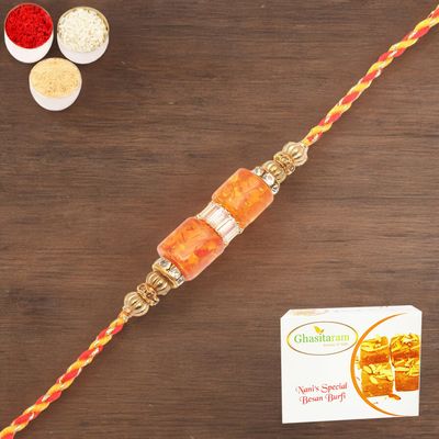Ghasitaram Gifts Rakhi for Brother Rakhis Online - RM598 - Orange Stone Bracelet Rakhi with 200 GMS of Besan Barfi