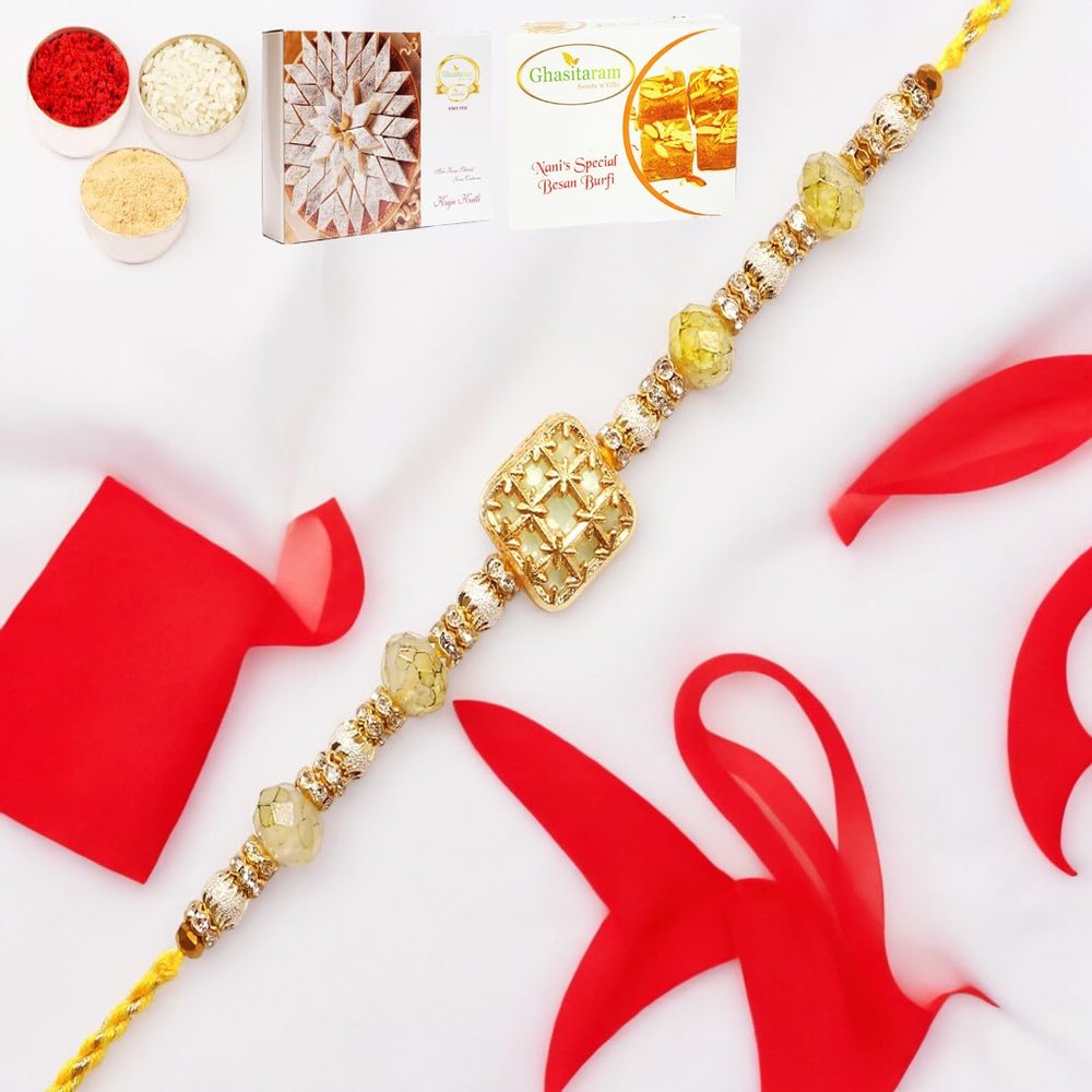 Ghasitaram Gifts Rakhi for Brother Rakhis Online - RM-759 Premium Rakhi with 200 GMS of Besan Barfi and 200 GMS of Kaju Katli