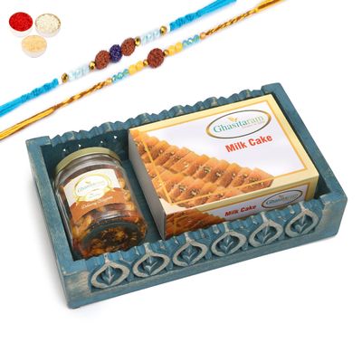 Ghasitaram Gifts Rakhi Gifts for Brothers Blue Wooden Tray with Milk Cake and Mix Dryfruits Jar with 2 Blue Rudraksh Rakhis