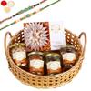 Ghasitaram Gifts Rakhi Gifts for Brothers Wooden Cane Round Basket of 4 Assorted Nuts and Kaju Katlis. with 2 Green Beads Rakhis view 1