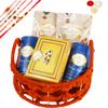 Ghasitaram Gifts Rakhi Gifts for Brothers Orange Jute Basket of assortments with Soan Papdi with 5 rakhis view 1