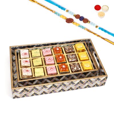 Ghasitaram Gifts Rakhi Gifts for Brothers Set of 2 Printed Blue Trays of Assorted Bites with 2 Blue Rudraksh Rakhis