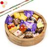 Jaiccha Ghasitaram Rakhi Gifts for Brothers Round Printed Tray of Assorted Bites and Cookies with 2 Green Beads Rakhis view 1