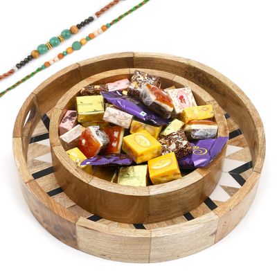 Jaiccha Ghasitaram Rakhi Gifts for Brothers Set of 2 Round Printed Trays of Assorted Bites and Cookies with 2 Green Beads Rakhis