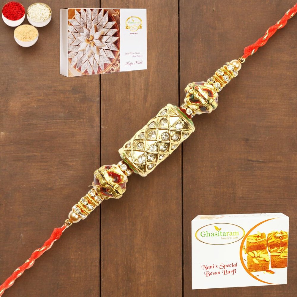 Ghasitaram Gifts Rakhi for Brother Rakhis Online - RM-579 PremiumRakhi with 200 GMS of Besan Barfi and 200 GMS of Kaju Katli