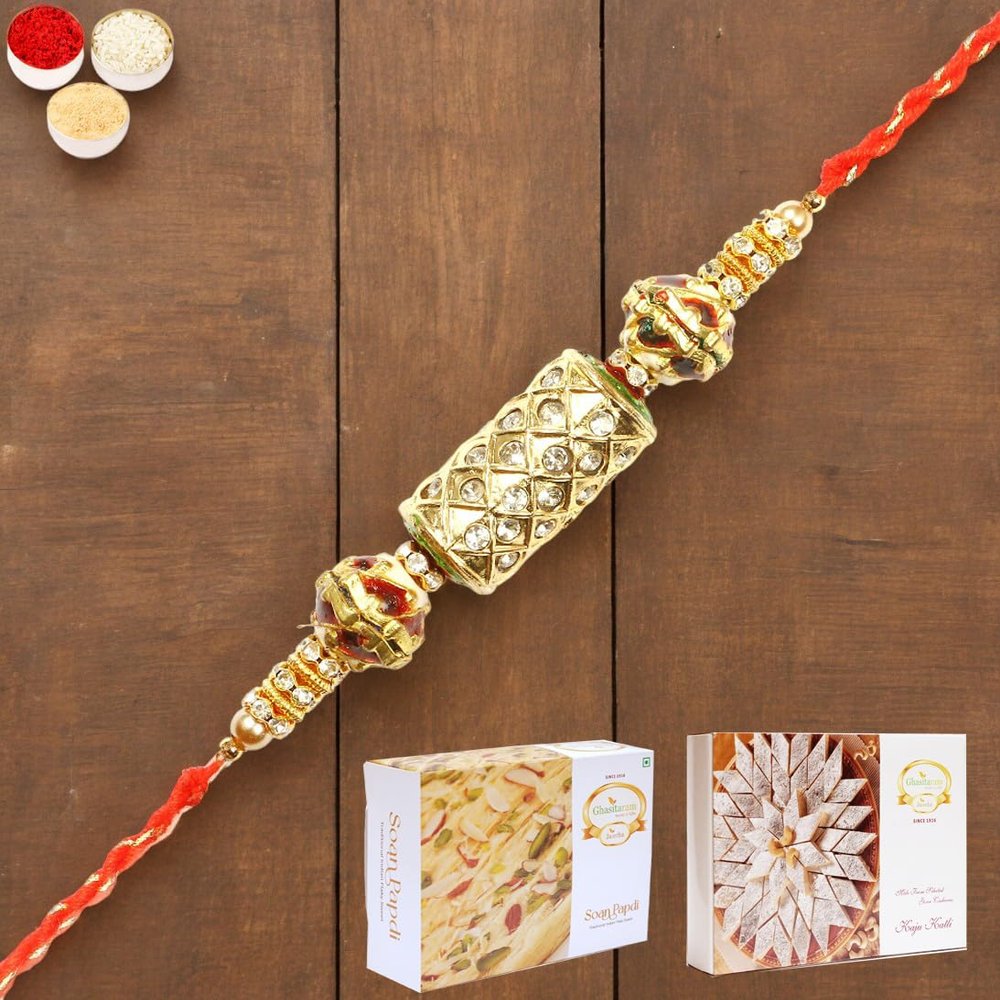 Ghasitaram Gifts Rakhi for Brother Rakhis Online - RM-579 PremiumRakhi with 200 GMS of Kaju katli and 200 GMS of Soan Papdi