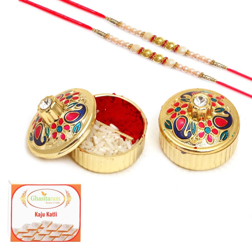 Ghasitaram Gifts Rakhi Gifts Pooja Thali - Set of 2 YCA-10 Tika Chawal Containers with 2 Pearl rakhis with 200 GMS of Kaju katli