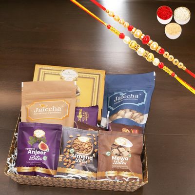 Ghasitaram Gifts Jaiccha Rakhi Gifts for Brothers - Brown Medium Tray of 9 Goodies with Soan papdi with 2 Rakhis