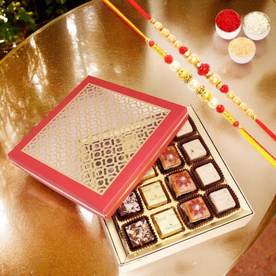 Ghasitaram Gifts Jaiccha Rakhi Gifts for Brothers - Carving Box with 16 pcs assorted bites and 2 Rakhis