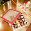 Ghasitaram Gifts Jaiccha Rakhi Gifts for Brothers - Carving Box with 16 pcs assorted bites and 2 Rakhis view 1