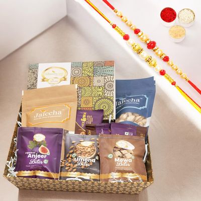 Ghasitaram Gifts Jaiccha Rakhi Gifts for Brothers - Brown Medium Tray of 9 Goodies with Milk Cake with 2 Rakhis