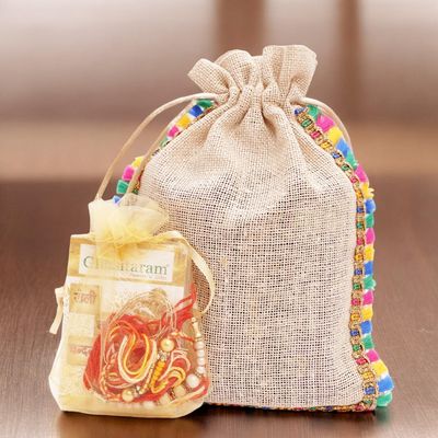 Ghasitaram Gifts Jaiccha Rakhi Gifts for Brothers - Colourful Jute Rakhi Pouch with Almonds with 2 Rakhis