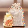 Ghasitaram Gifts Jaiccha Rakhi Gifts for Brothers - Colourful Jute Rakhi Pouch with Almonds with 2 Rakhis view 1