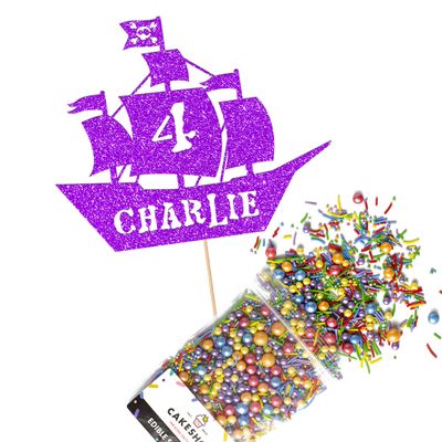 Cakeshop Cake Decoration Pack | Pirate Ship Birthday Premium Double Sided Glitter Card Cake Topper & 25g Party Pack of Cake Sugar Sprinkles | Custom Name & Age Cake Decorations (Purple)