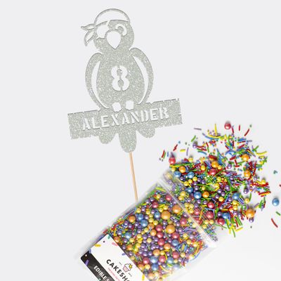 Cakeshop Cake Decoration Pack | Parrot Pirate Premium Double Sided Glitter Card Cake Topper Sign & 25g Party Pack of Cake Sugar Sprinkles | Custom Name & Age Cake Decorations (Light Silver)