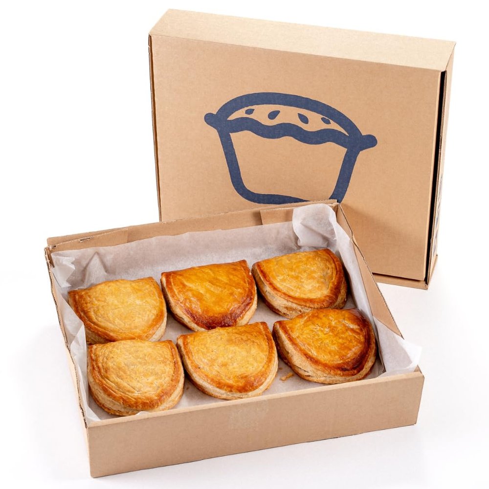 D-Shaped Corned Beef and Onion Pasties  Golden Pastry Shell with Juicy Filling  Traditional British Snack or Meal On-the-Go  Delivered Fresh to Your Door - 12 Pack