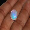 100% Natural white Ethiopian Opal very good fleshy fire Shape Oval Size 15.7x12.2x5.7mm Weight 5.1 Cts view 4