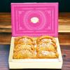 Ghasitaram Gifts Jaiccha Holi- Sweets/Holi Hampers/Thandai Ghasitaram Orange Hamper Box with Gujiyas, Thandai, Bhakarwadi, and Butter Chakli Pouch view 3