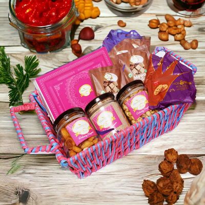 Ghasitaram Gifts Jaiccha Holi- Sweets/Holi Hampers/Thandai Pink Square Basket of 12 Goodies with Gujiyas