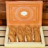 Ghasitaram Gifts Jaiccha Holi- Sweets/Holi Hampers/Thandai Ghasitaram Orange Hamper Box with Sugarfree Wheat Gujiyas, Wheat Puffs and Moong Chakli view 2