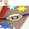 Ghasitaram Gifts Jaiccha Rakhi for Brother Rakhis Online KR23-135- Metal Charm Kids Rakhi with Chocolate Coated Almonds 200 GMS view 1