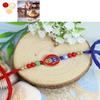 Ghasitaram Gifts Jaiccha Rakhi for Brother Rakhis Online ST23-161 Evil Eye Premium Rakhi with Mewa Bite Box view 1