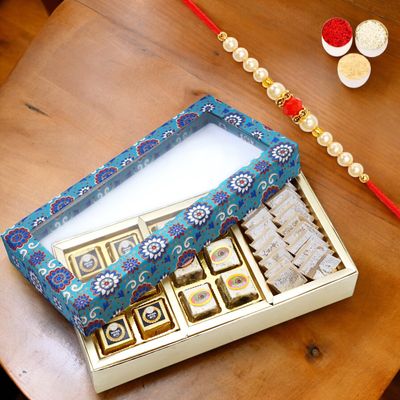 Ghasitaram Gifts Jaiccha Rakhi Gifts for Brothers 3 Part Printed Box of Bites and Kaju Katli with Pearl Beads Rakhi