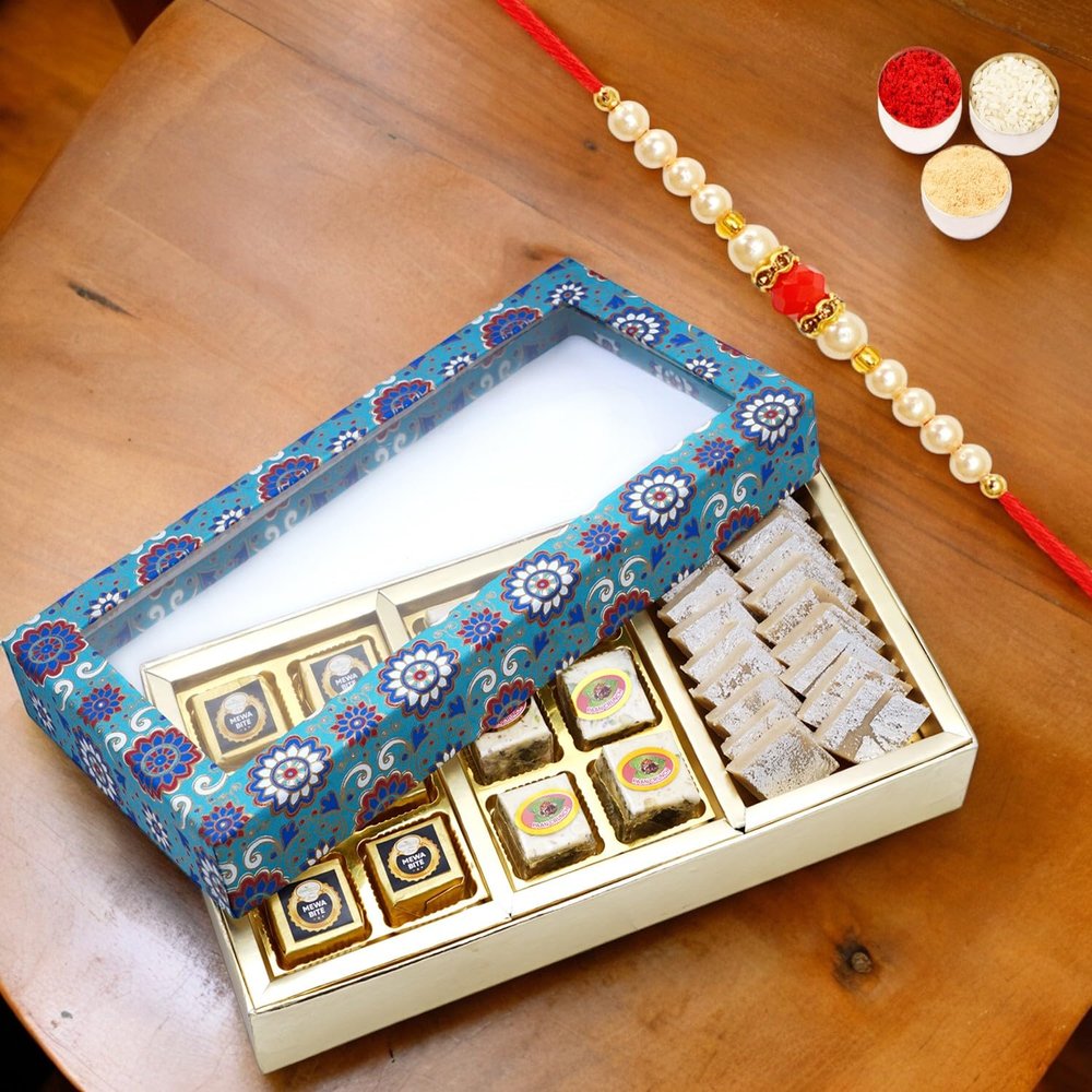Ghasitaram Gifts Jaiccha Rakhi Gifts for Brothers 3 Part Printed Box of Bites and Kaju Katli with Pearl Beads Rakhi