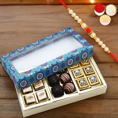 Ghasitaram Gifts Jaiccha Rakhi Gifts for Brothers 3 Part Printed Box of Bites and Exotic Sweets with Pearl Beads Rakhi