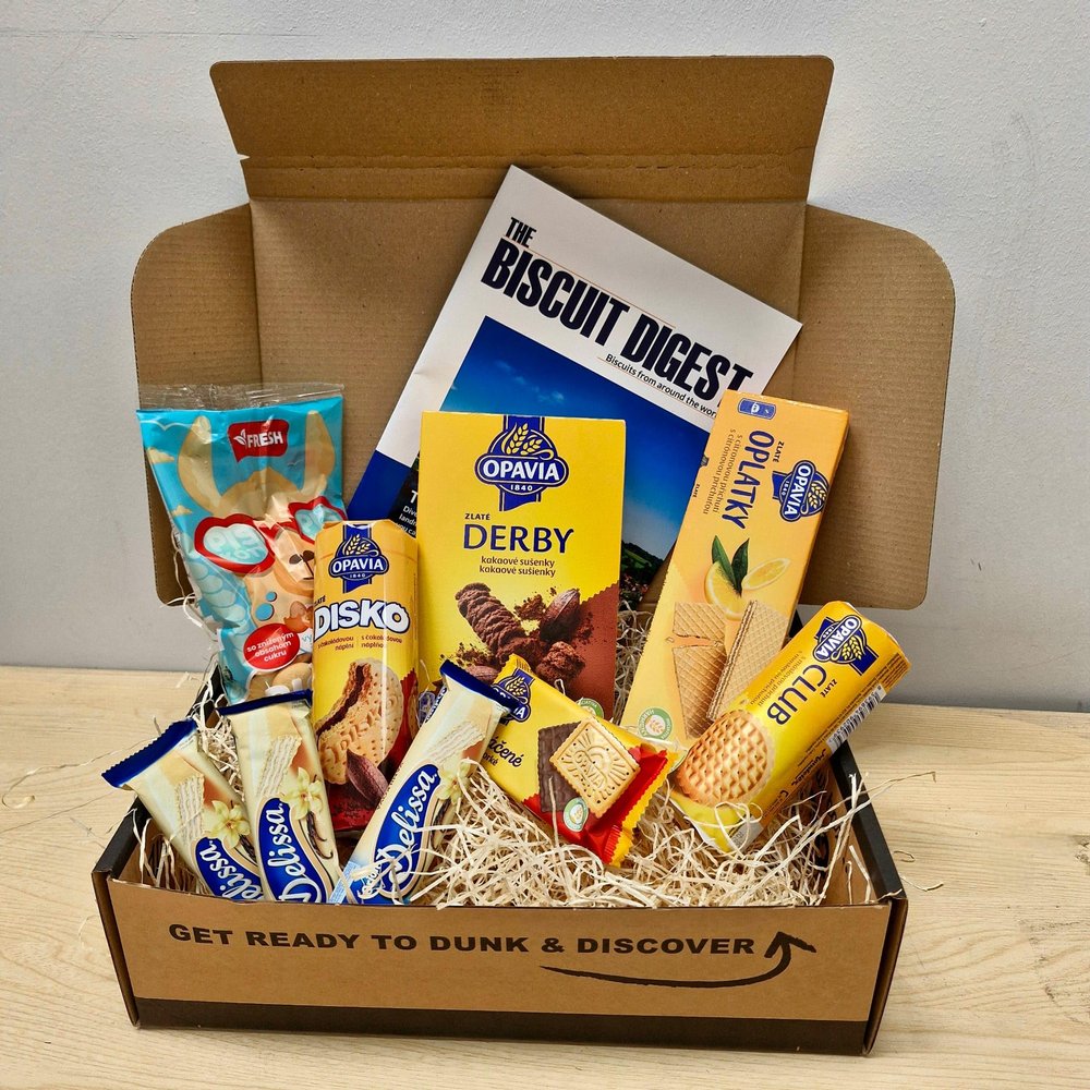 International Biscuit Gift Set with 7 packs of popular biscuits. Includes A4 glossy magazine and puzzles. Gift hamper for all occasions (Czech Republic)