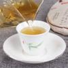 200g Yunnan Yiwu Ancient tree Pu-erh Raw Tea Cake from Century old Trees - Premium with Rich Flavor view 4